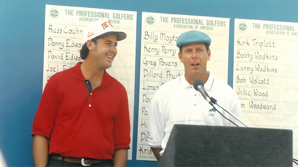 Vince Gill and Payne Stewart speaking to participants of The Vinny